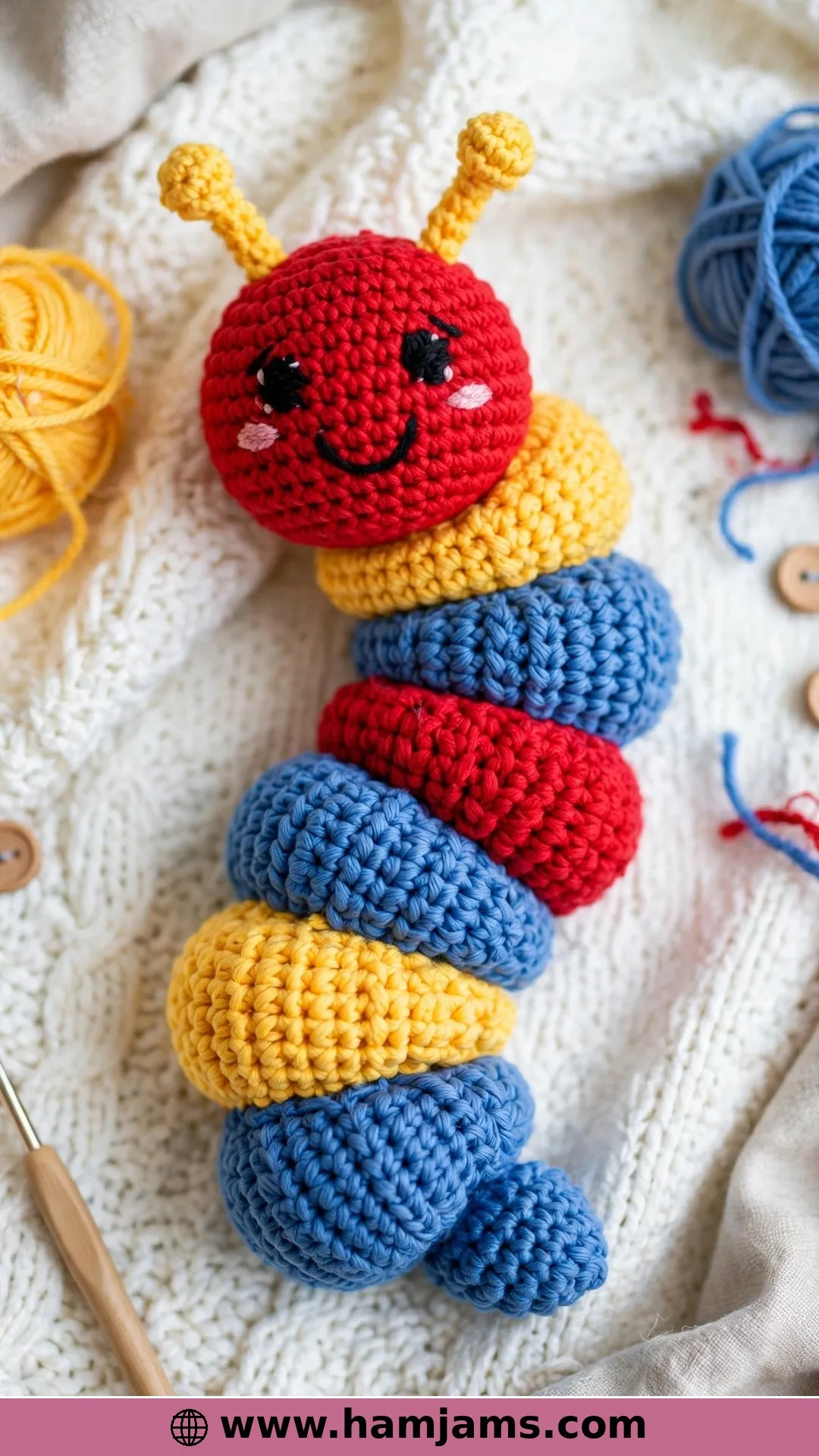 A Lion Brand Baby Toy in Classic Colours